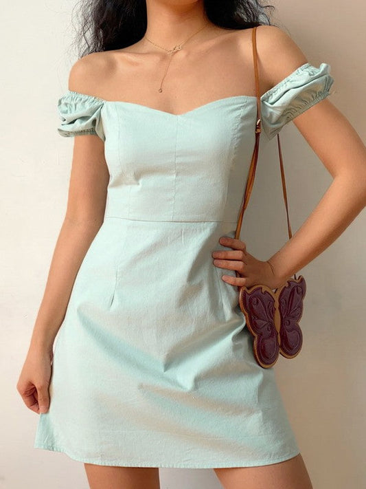 CM | Minivestido vintage con mangas abullonadas