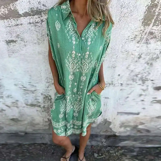 CM | Vestido midi con bolsillos abotonados