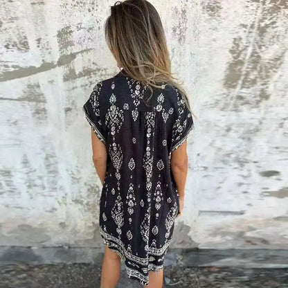 CM | Vestido midi con bolsillos abotonados