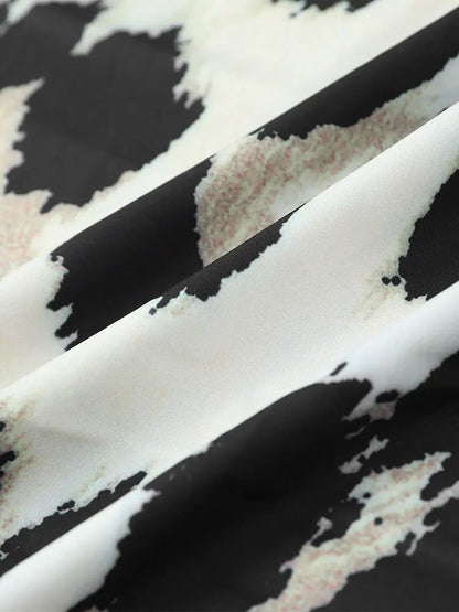 CM | Vestido midi con estampado de leopardo y mangas tres cuartos