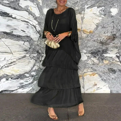 CM | Vestido maxi fluido en un look a capas