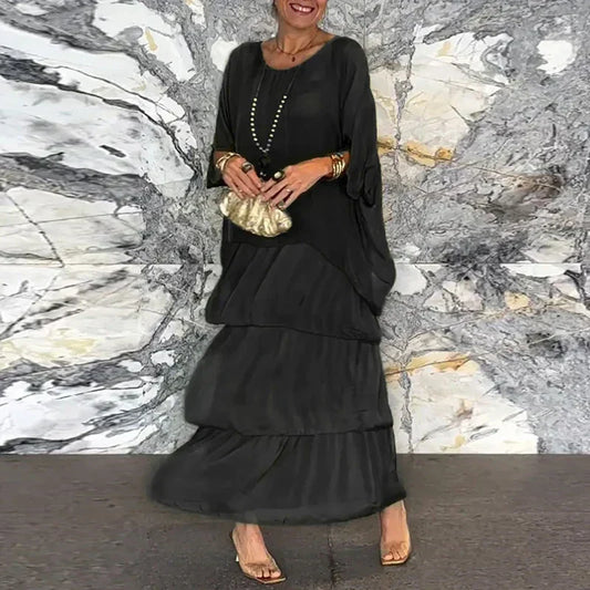 CM | Vestido maxi fluido en un look a capas