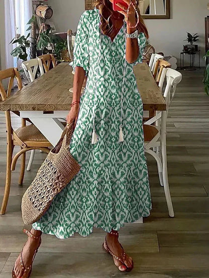 CM | Vestido midi con estampado boho y manga corta