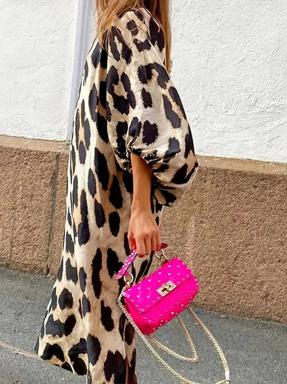 CM | Vestido midi con estampado de leopardo y mangas tres cuartos