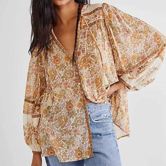 CM | Blusa boho con cuello en V y estampado floral