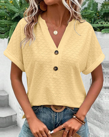 CM | Camisa de manga corta monocolor con escote de muesca y ojales