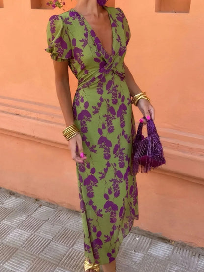 CM | Vestido midi estampado de manga corta y escote pronunciado