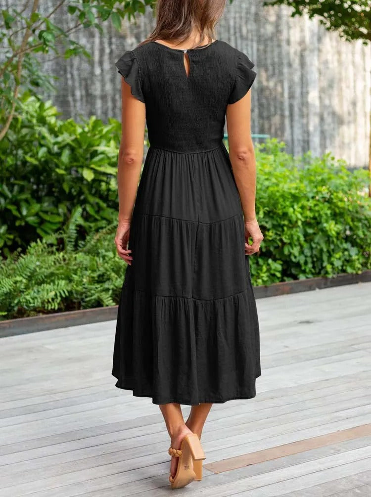 CM | Vestido midi fluido y escalonado