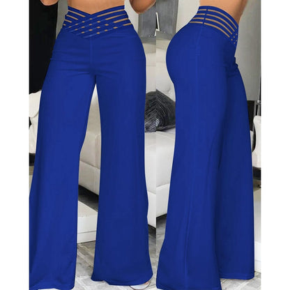 CM | Pantalones acampanados de elastano con cintura cruzada