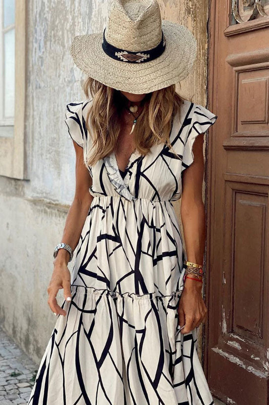 CM | Vestido midi de volantes con estampado geométrico y cuello en V