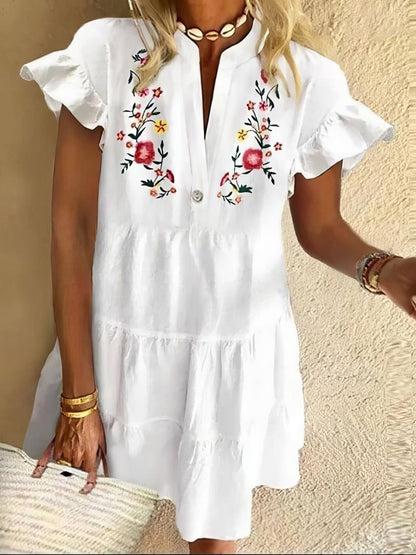 CM | Minivestido de flecos con estampado floral y escote en V