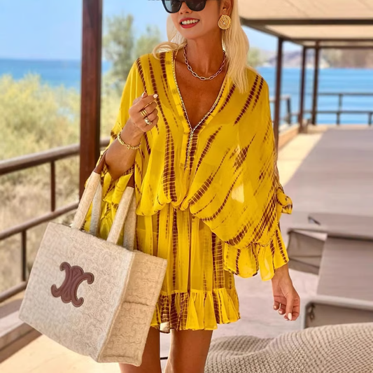 CM | Minivestido chic con escote alto en V