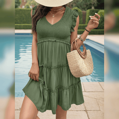 CM | Mini vestido verde relajado con volantes para tus vacaciones de verano