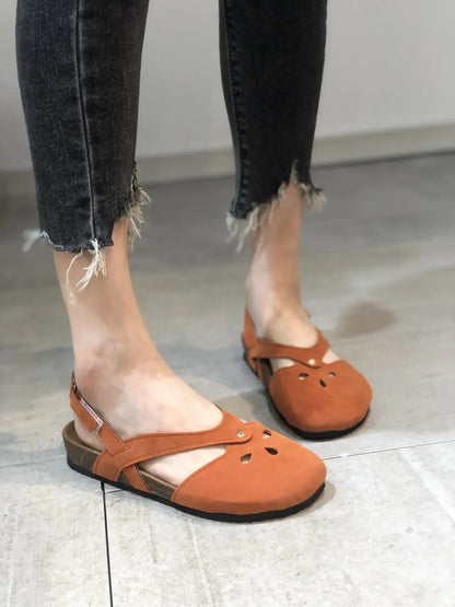 CM | Sandalias con tiras en la espalda