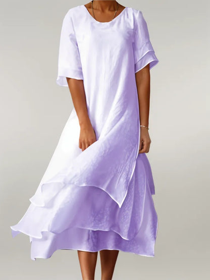 CM | Vestido midi fluido a capas