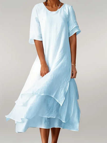 CM | Vestido midi fluido a capas
